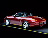 POR 04 RK0093 02
1997 Porsche Boxster Convertible Burgundy 3/4 Rear View Studio