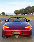 POR 04 RK0101 01
1997 Porsche Boxster Convertible Burgundy Rear Shot On Pavement By Trees