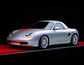 POR 04 RK0186 05
1998 Porsche Boxster Hard Top Silver 3/4 Side View On Red Floor Studio