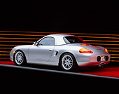 POR 04 RK0192 02
1998 Porsche Boxster Silver 3/4 Rear View On Red Floor  Studio