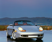 POR 04 RK0200 02
1998 Porsche Boxster Convertible Silver 3/4 Front View On Pavement Mountains Background