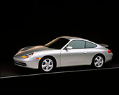 POR 04 RK0356 02
1999 Porsche 911 Carrera Coupe Silver (996) 3/4 Side View on black with gray line in studio rear spoiler up