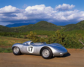 POR 04 RK0387 02
Porsche RSK Siver 3/4 Side View On Dirt Hills Background Blue Cloudy Sky