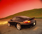 POR 04 RK0462 06
2001 Porsche 911 Twin Turbo Black Wide Angle 3/4 Rear View On Pavement