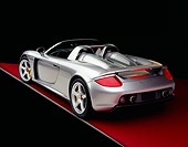 POR 04 RK0573 12
2004 Porsche Carrera GT Silver 3/4 Rear View On Red Floor Gray Line Studio