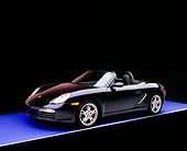 POR 04 RK0595 01
2005 Porsche Boxster S Convertible Dark Blue 3/4 Side View On Purple Floor Gray Line Studio