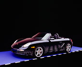 POR 04 RK0596 01
2005 Porsche Boxster S Convertible Dark Blue 3/4 Side View On Purple Floor Checkered Line Studio