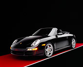POR 04 RK0600 04
2005 Porsche 911 S Carrera Convertible Black 3/4 Front View On Red Floor Gray Line Studio