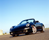POR 04 RK0605 02
2005 Porsche 911 S Carrera Convertible Black Slanted Low 3/4 Front View On Pavement