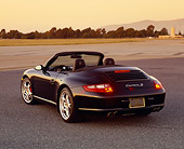 POR 04 RK0613 02
2005 Porsche 911 S Coupe Convertible Black 3/4 Rear View On Pavement Filtered