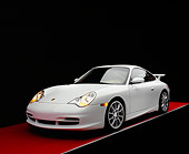 POR 04 RK0632 02
2005 Porsche 911 GT3 Coupe White 3/4 Front View On Red Floor Gray Line Studio