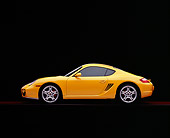POR 04 RK0648 01
2006 Porsche Cayman S Yellow Profile View On Red Floor Studio