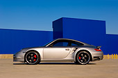 POR 04 RK0666 01
2007 Porsche 911 Turbo Silver Profile View On Pavement By Building