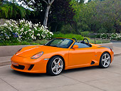 POR 04 RK0694 01
2007 Porsche RUF Spyder Orange 3/4 Front View On Pavement By Trees And Flowers