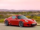 POR 04 RK0696 01
2007 Porsche RUF RK Coupe Red 3/4 Front View On Pavement By Hills