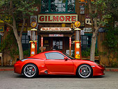 POR 04 RK0699 02
2007 Porsche RUF RK Coupe Red Profile View On Pavement Gas Station