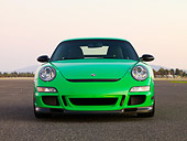 POR 04 RK0763 01
2007 Porsche 911 GT3 RS Green Front View On Pavement By Trees Mountain Sky