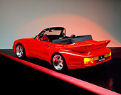 POR 05 RK0009 03
1990 Porsche Koenig Convertible Red 3/4 Rear View Studio