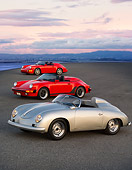 POR 07 RK0120 01
1957, 1989, 1994 Porsche Speedster Convertibles Silver And Red 3/4 Front View On Pavement