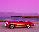 POR 07 RK0065 01
1959 Porsche Speedster Red 3/4 Front View On Pavement By Water Filtered