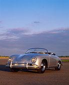 POR 07 RK0076 02
1958 Porsche Speedster Silver  3/4 Front View On Pavement With Sky And Clouds