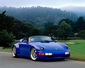 POR 07 RK0102 03
1994 Porsche 911 Strosek Speedster Convertible Blue 3/4 Front View On Pavement Gy Golf Course