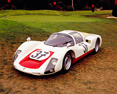 POR 27 RK0030 05
1966 Porsche Carrera 906 Race Car White And Red 3/4 Front View On Grass