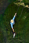 REC 04 DB0003 01
Man Standing In Stream Catching Fish In Net