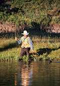 REC 04 DS0002 01
Man Kneeling On Shore Catching Fish