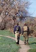 REC 04 DS0006 01
Two Fishermen Walking Down Trail Carrying Fishing Rods