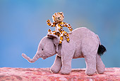 TED 01 RK0095 18
Stuffed Animal Leopard Riding Elephant Blue Background
Roger Morris/Fortunato
