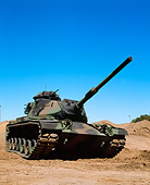 TNK 01 RK0007 11
Camouflage M-60 Tank 3/4 Front View On Dirt By Tree Blue Sky