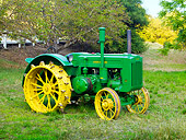TRA 01 RK0137 01
1947 John Deere D Tractor Green 3/4 Side View On Grass By Trees
