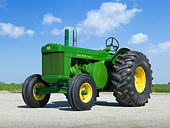 TRA 01 RK0226 01
John Deere R Diesel Tractor Green And Yellow 3/4 Front View On Gravel By Farm