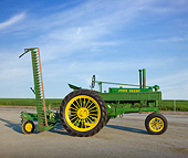 TRA 01 RK0235 01
1936 John Deere Model B Tractor Green And Yellow Profile View On Pavement By Farm