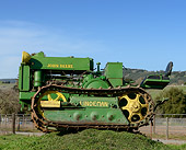 TRA 01 RK0280 01
1942 John Deere Lindeman Tractor Green Profile View On Grass