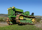TRA 01 RK0281 01
1942 John Deere Lindeman Tractor Green 3/4 Front View On Grass