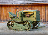 TRA 01 RK0287 01
1919 Caterpillar Holt Green 3/4 Side View On Gravel By Shed