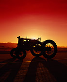 TRA 01 RK0005 03
1932 Farmall F-12 Tractor 3/4 Front View Silhouette At Sunset