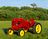 TRA 01 RK0008 02
1944 Massey-Harris Pony Tractor 3/4 Front View On Grass Trees