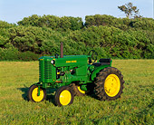 TRA 01 RK0010 02
John Deere M Tractor Green 3/4 Front View On Grass Trees