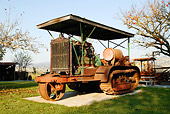TRA 01 RK0013 01
1917 Holt 75 Tractor 3/4 Front View Trees Blue Sky