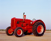 TRA 01 RK0052 07
1947 LA Case Red Tractor 3/4 Side View On Dirt Blue Sky