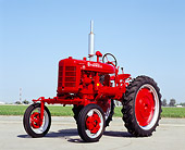 TRA 01 RK0068 04
1940's Farmall AV Red Tractor 3/4 Front View On Pavement Blue Sky