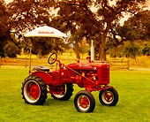 TRA 01 RK0106 02
1951 International Harvester Farmall A Red With Umbrella 3/4 Side View On Grass