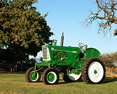TRA 01 RK0111 03
1960 Oliver 770 Green And White Tractor 3/4 Side View On Grass