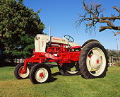 TRA 01 RK0116 04
1957 Ford Powermaster 950 Red And Gray 3/4 Front View On Grass By Trees