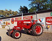 TRA 01 RK0123 01
1958 Farmall 350 High Clearance Red And White 3/4 Side View On Gravel By Decals