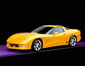 VET 01 RK0553 06
2002 Chevrolet Corvette Z06 Avelate Yellow 3/4 Side View On Purple Floor Studio