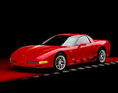 VET 01 RK0627 06
2004 Chevrolet Corvette Z06 Red 3/4 Front View On Red Floor Checkered Line Studio